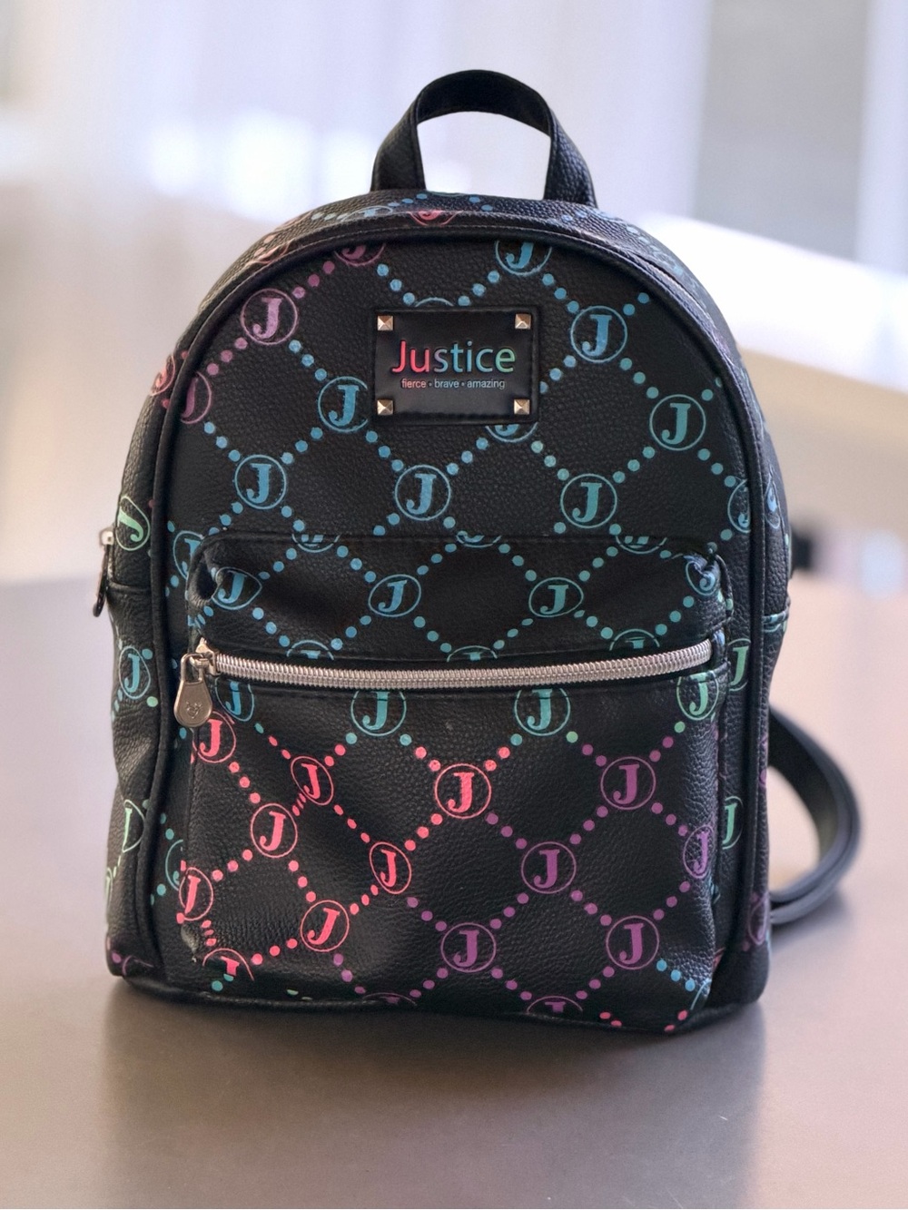 Small Justice Black Mini Backpack with Multicolor Logo Print